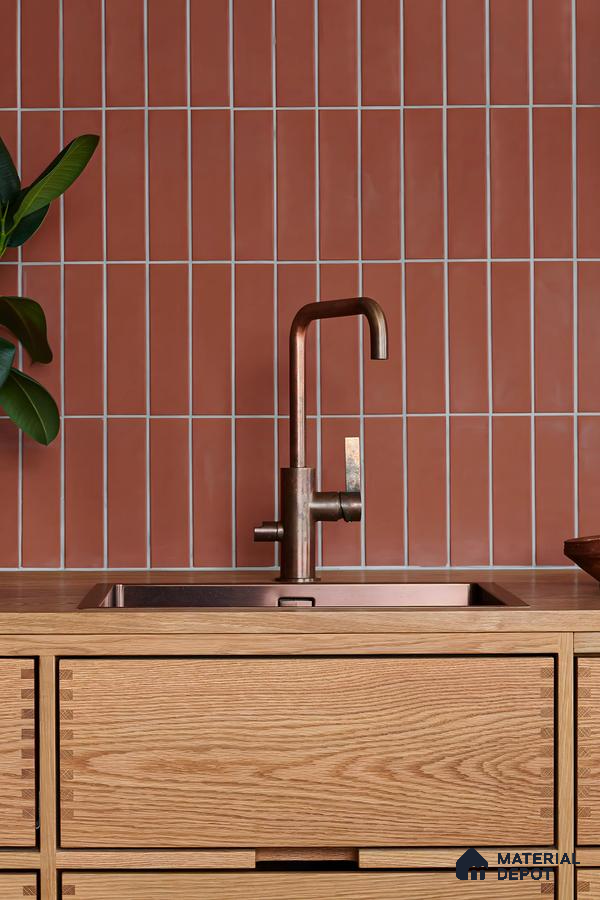 Terracotta Tile Backsplash with Copper Faucet and Oak Cabinetry | Material Depot