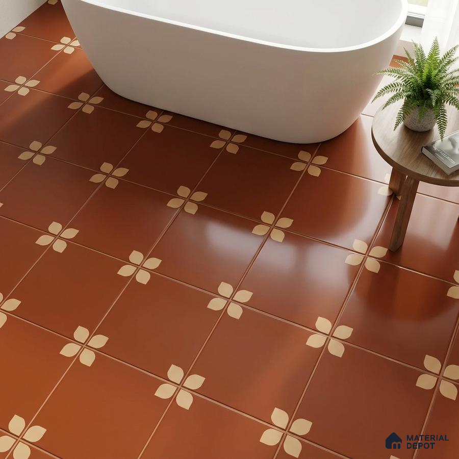 Modern bathroom with terracotta floral patterned floor tiles and freestanding tub