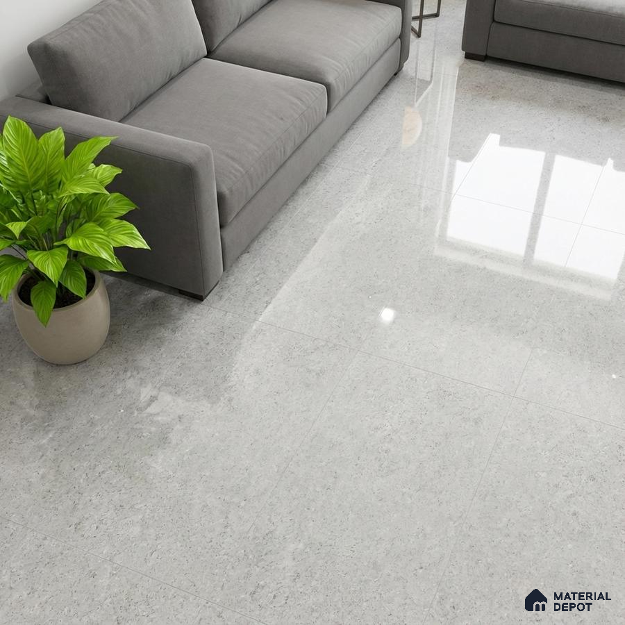 Minimalist living room with grey polished marble floor tiles and grey fabric sofa