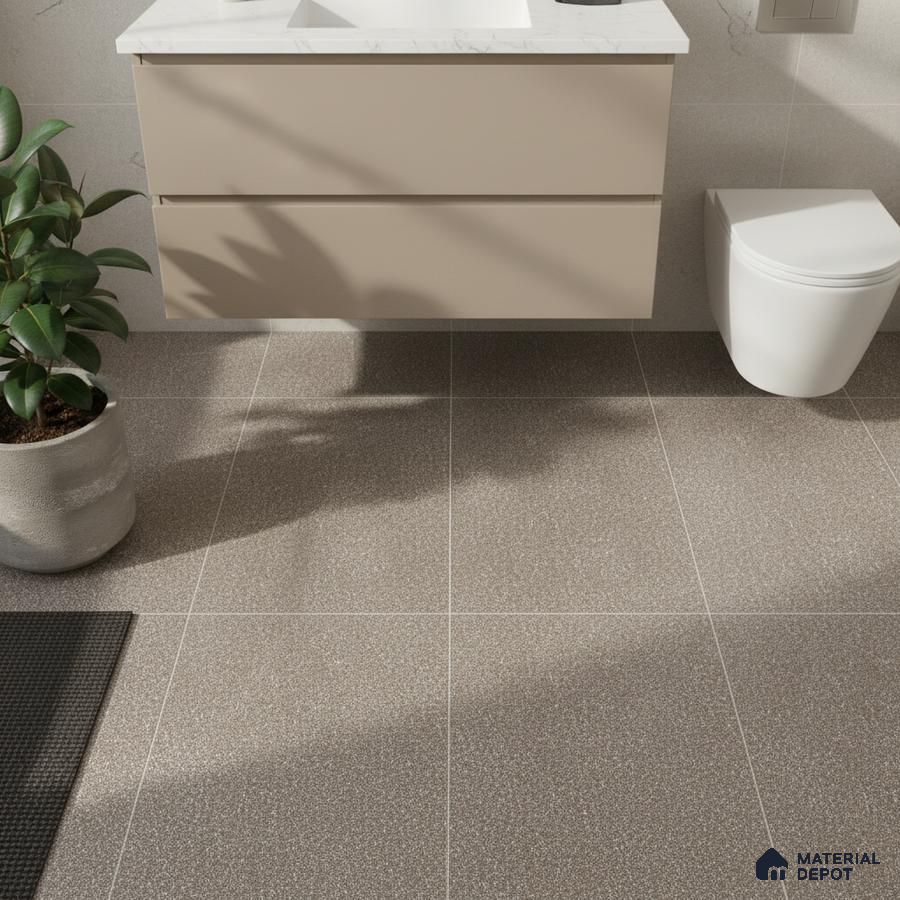 Minimalist bathroom with beige floating vanity, white marble countertop, and taupe terrazzo floor tiles