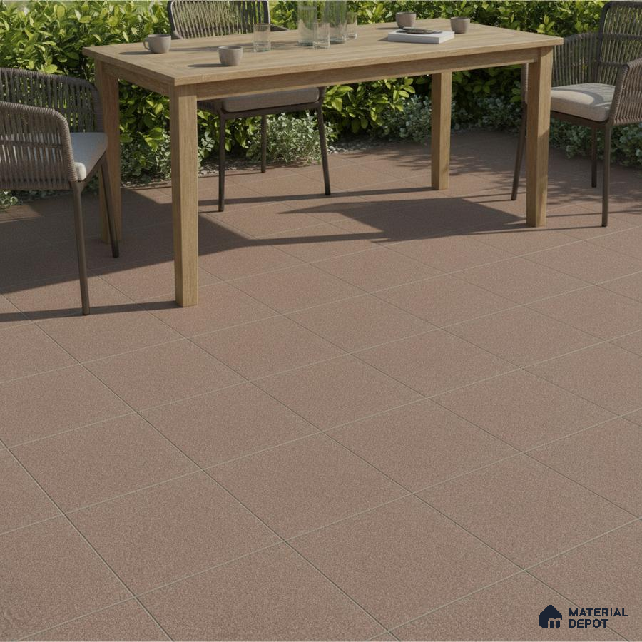 Minimalist outdoor space with matte terracotta floor tiles and natural wood dining table