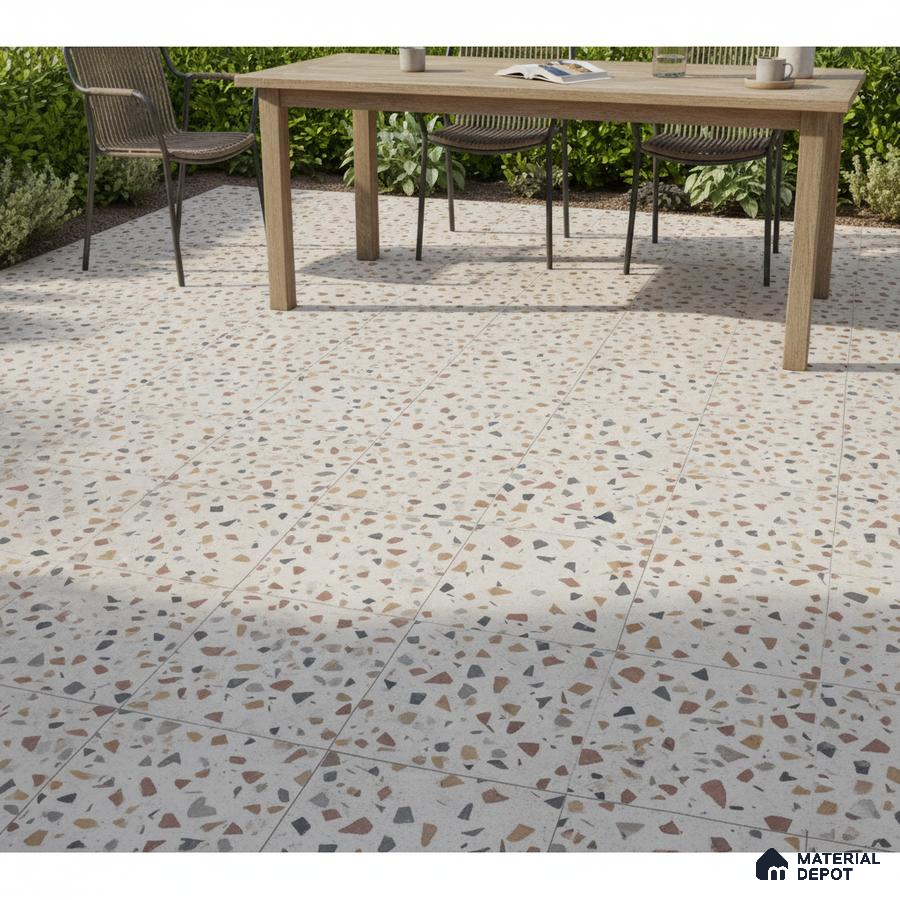 Modern outdoor space with multicolor terrazzo floor tiles and natural wood dining table