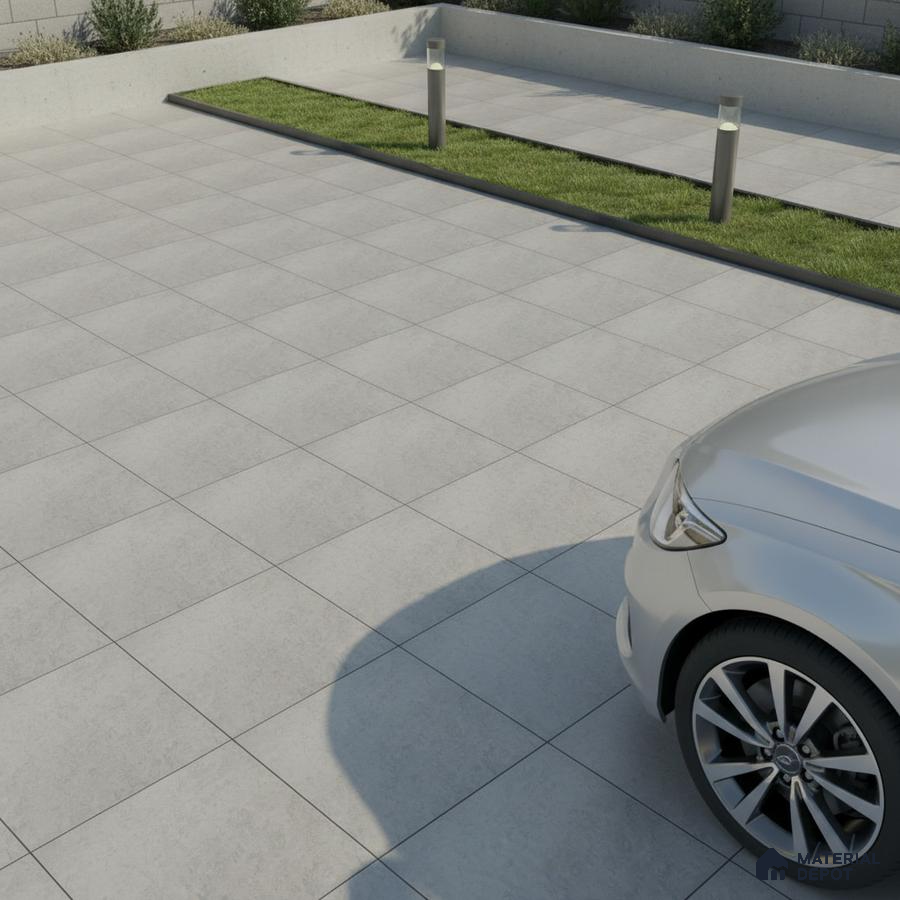 Minimalist parking area with light grey stone-look anti-skid floor tiles