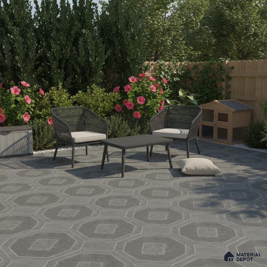 Modern outdoor seating with grey geometric floor tiles and black wicker furniture