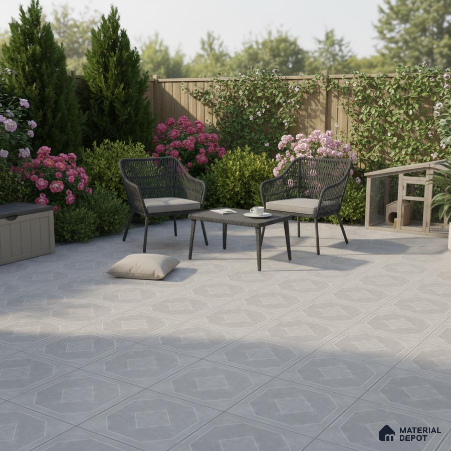 Modern outdoor patio with geometric light grey floor tiles and wicker furniture