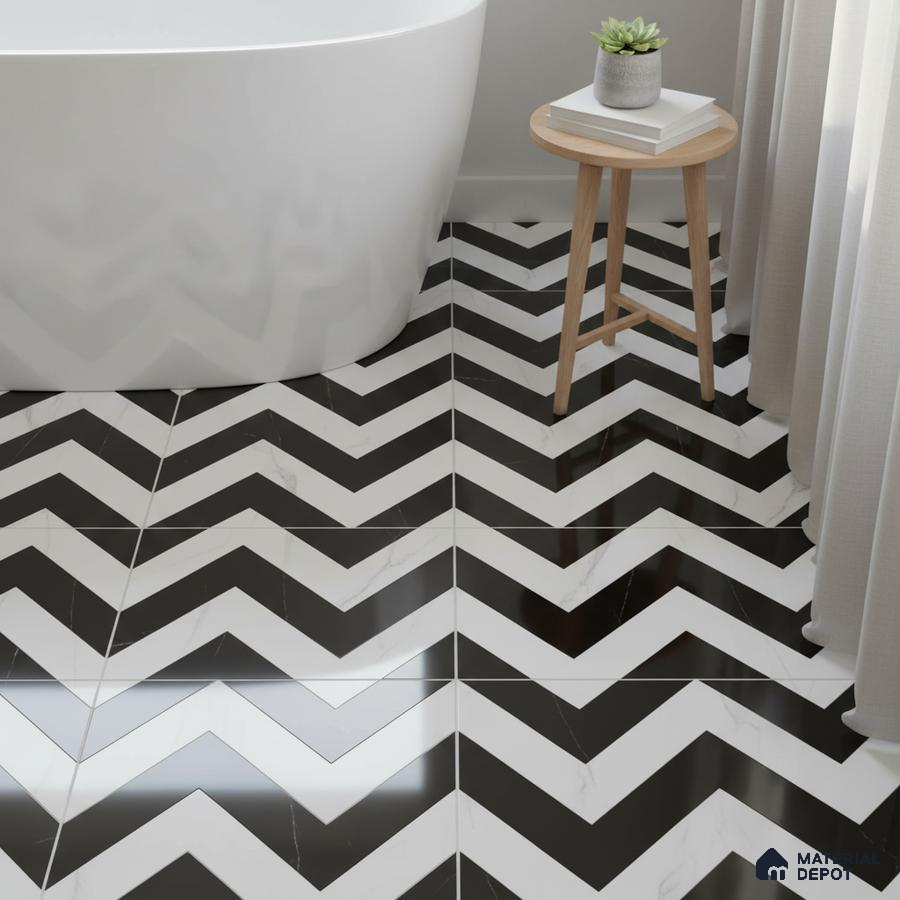 Modern bathroom with black-and-white chevron floor tiles and freestanding tub