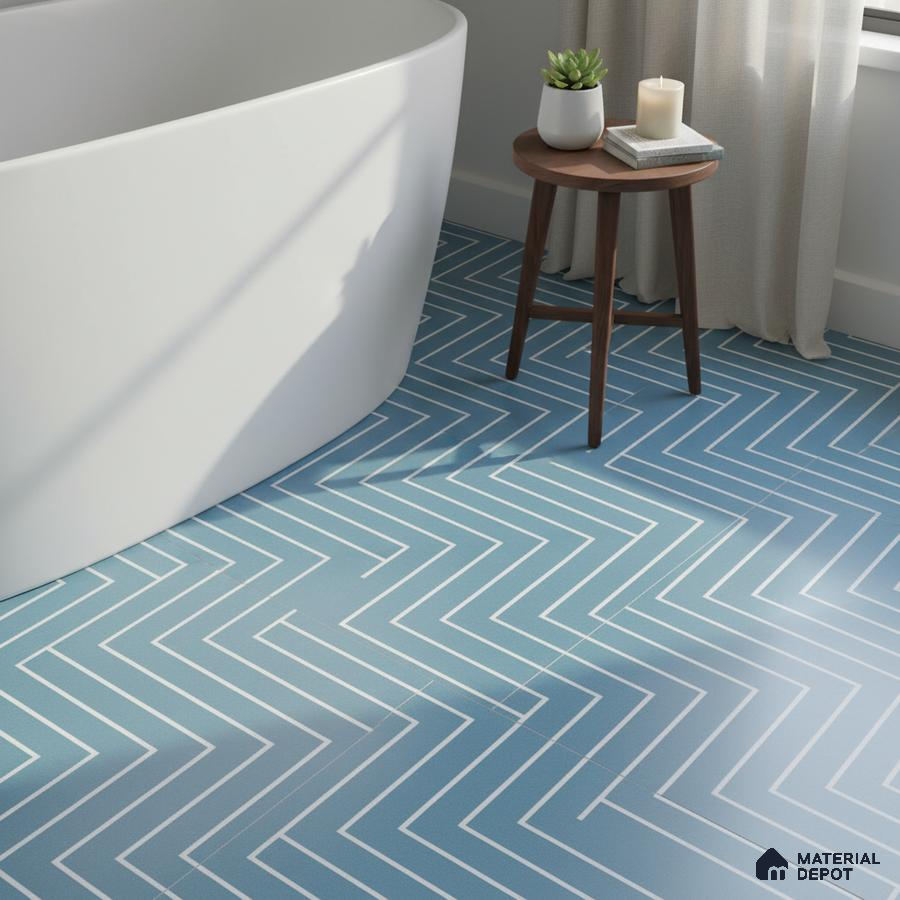 Modern bathroom with blue geometric zigzag floor tiles and freestanding tub