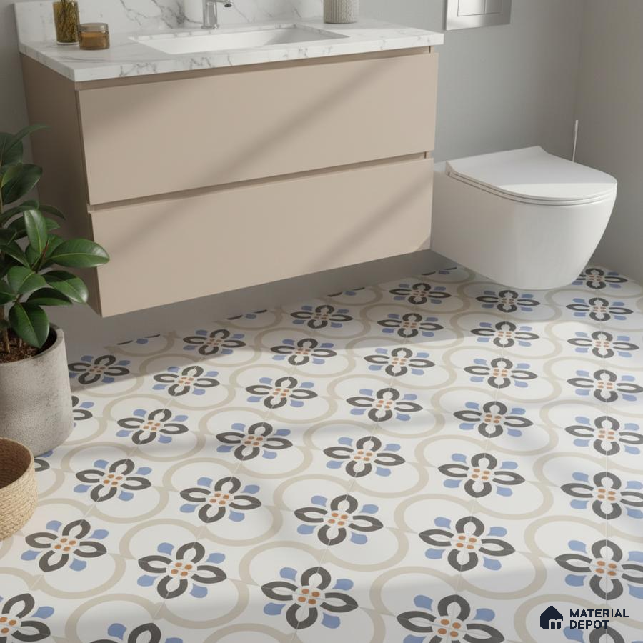 Modern bathroom with beige floating vanity, marble countertop, and blue floral patterned floor tiles
