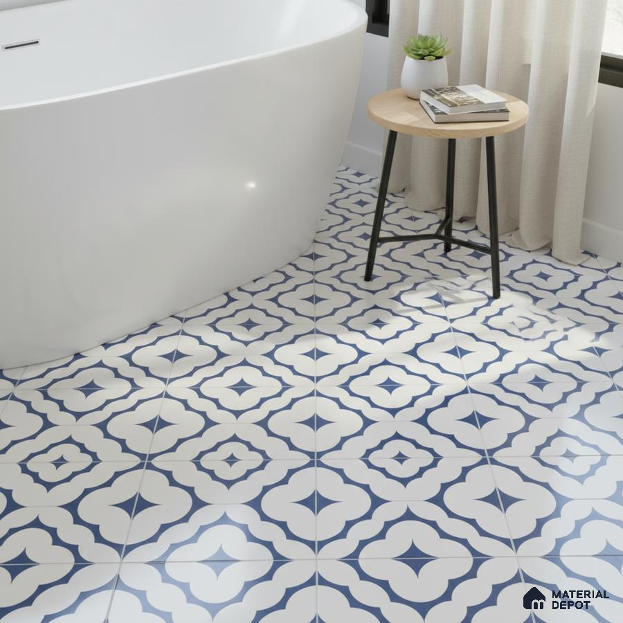 Modern bathroom with blue and white geometric patterned floor tiles