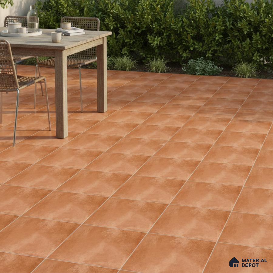 Modern outdoor patio with terracotta floor tiles and wooden dining set