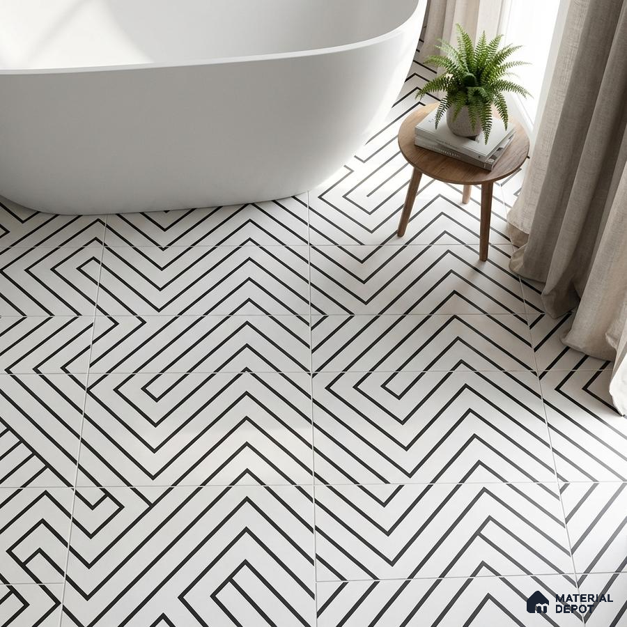 Modern bathroom with black-and-white geometric floor tiles and freestanding tub