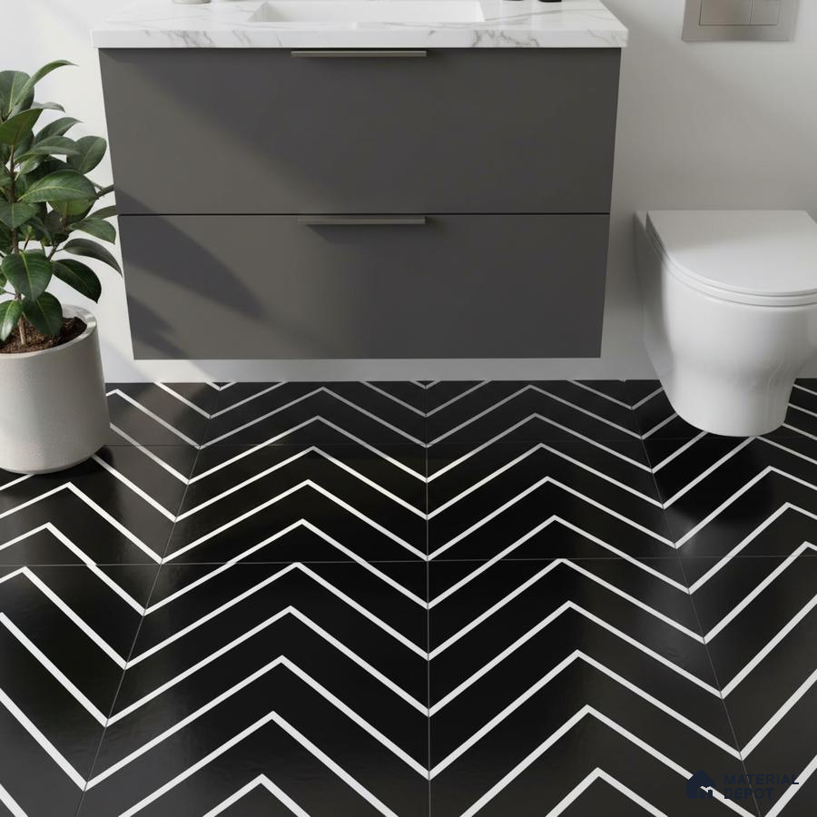 Modern bathroom with matte grey vanity and black-and-white chevron floor tiles