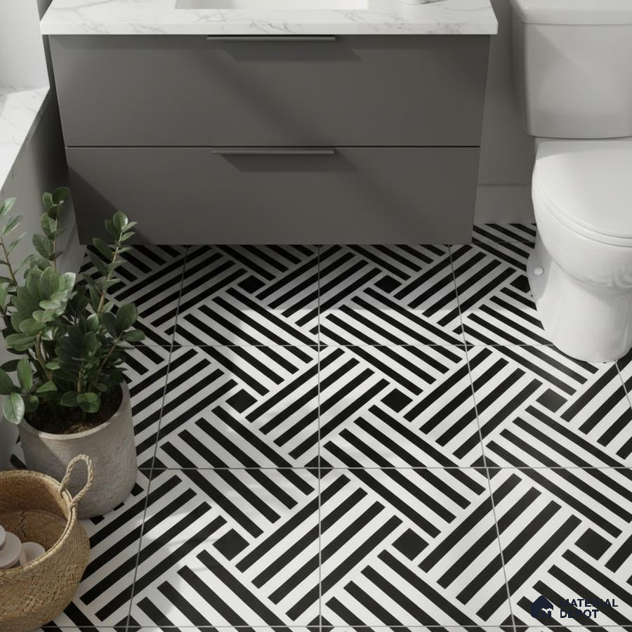 Modern bathroom with geometric black-and-white floor tiles and grey vanity with marble countertop