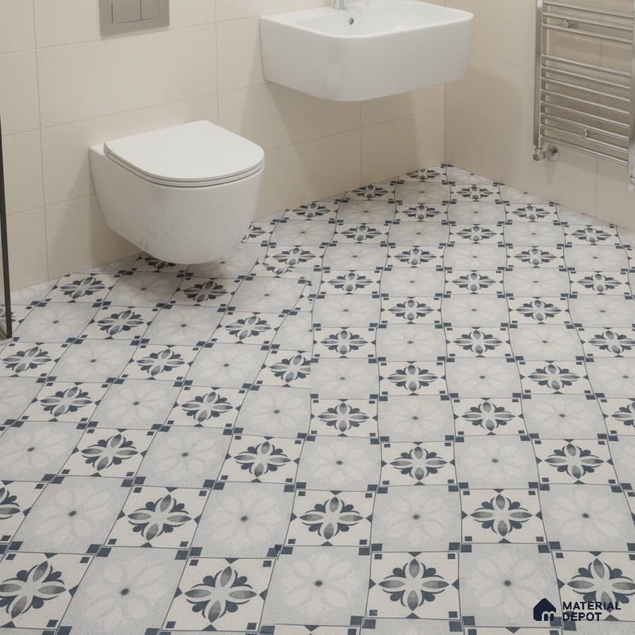 Modern bathroom with blue and white floral patterned floor tiles and beige wall tiles