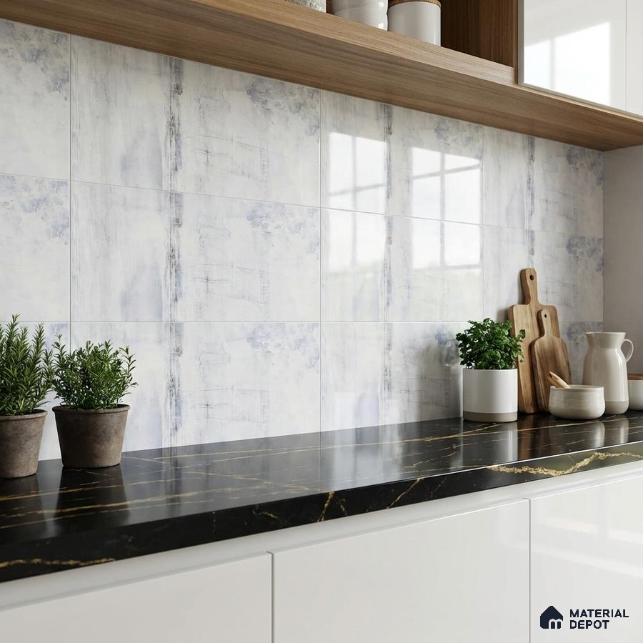 Modern kitchen with black marble countertop, white abstract wall tiles, and white laminate cabinets