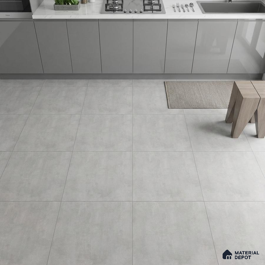 Modern kitchen with grey matte laminate cabinets and light grey stone-look floor tiles