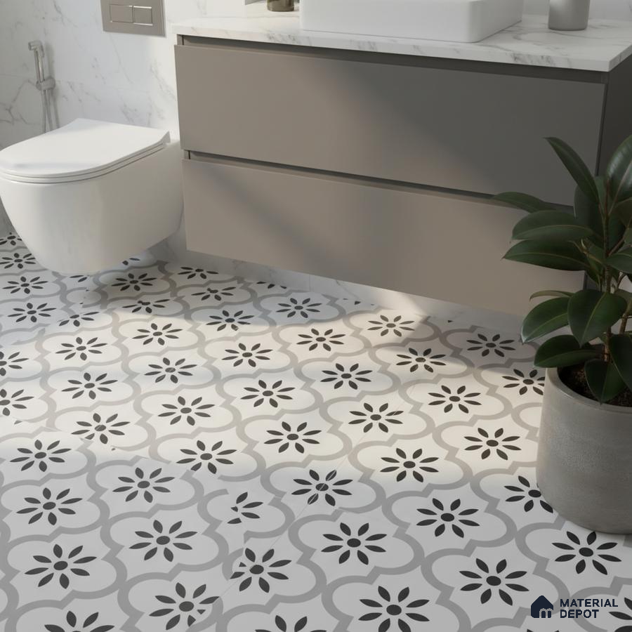 Modern bathroom with grey vanity, white marble countertop, and black-and-white floral patterned floor tiles