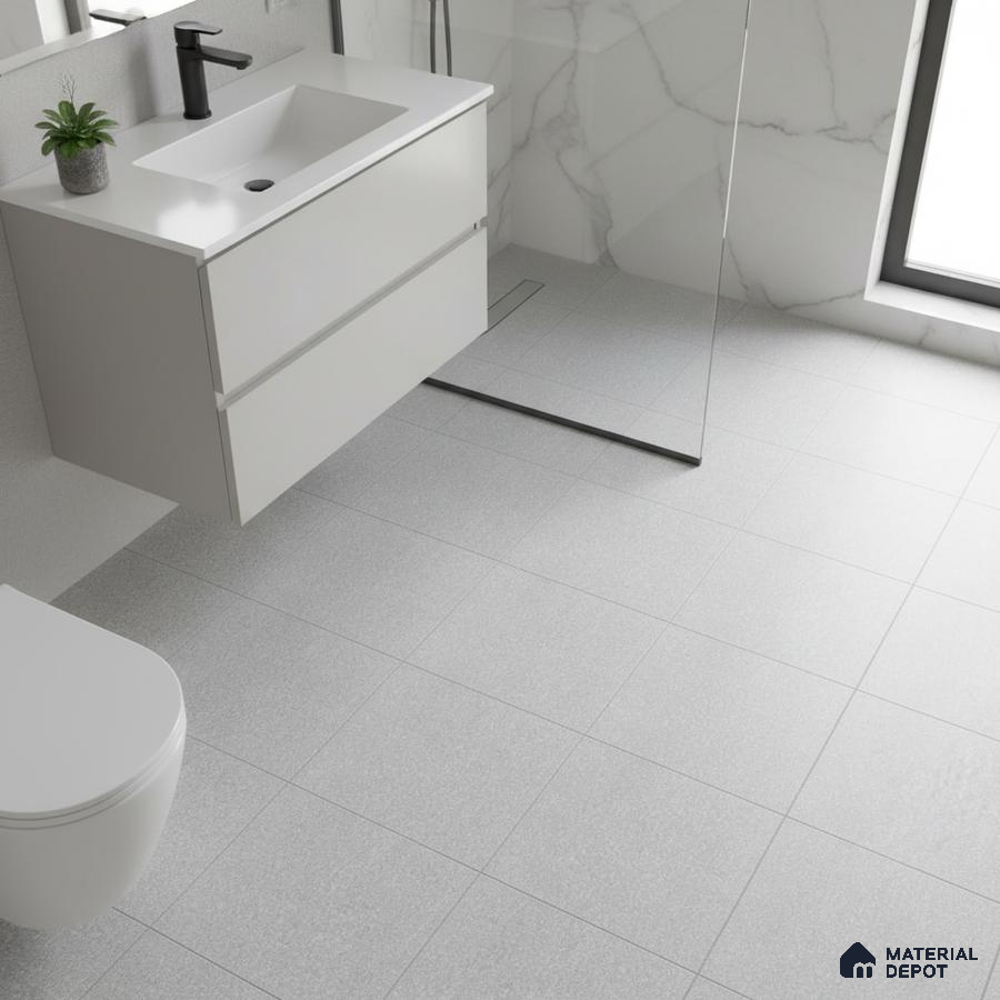 Minimalist bathroom with matte white vanity, marble wall tiles, and light grey floor tiles