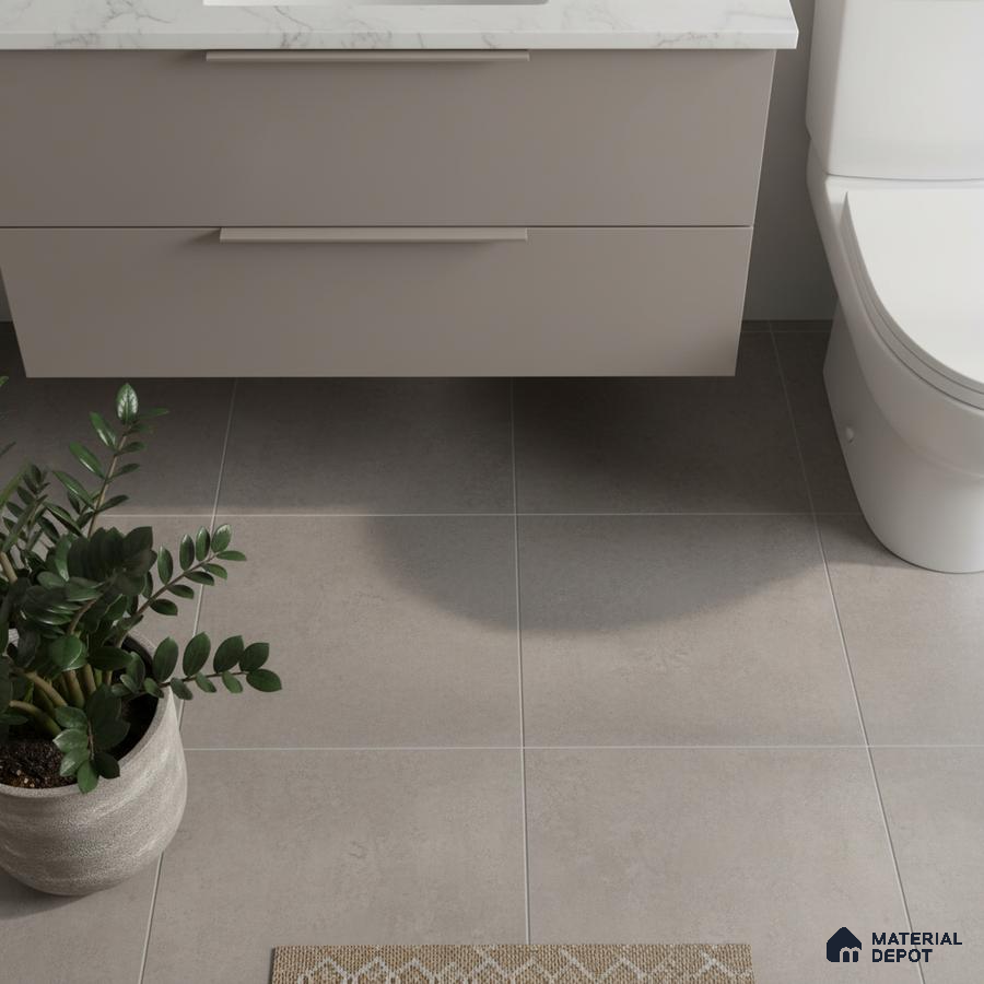 Minimalist bathroom with matte grey floor tiles and white marble-look countertop
