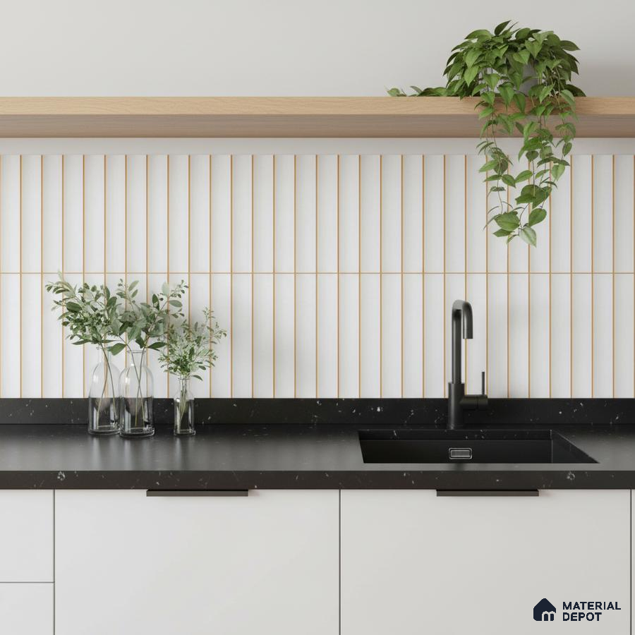 Minimalist kitchen with white vertical kitkat backsplash tile, black quartz countertop, and light oak open shelf