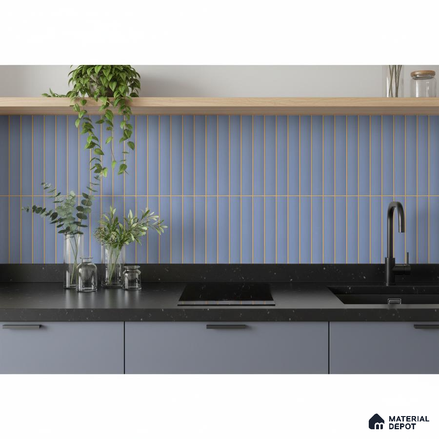 Modern kitchen with pastel blue kitkat backsplash tile, matte black quartz countertop, and blue laminate cabinets