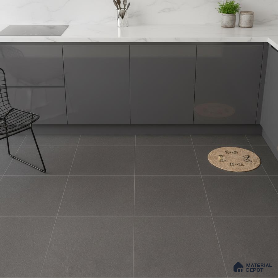 Modern kitchen with grey high gloss laminate cabinets, white marble-look quartz countertop, and charcoal grey floor tiles