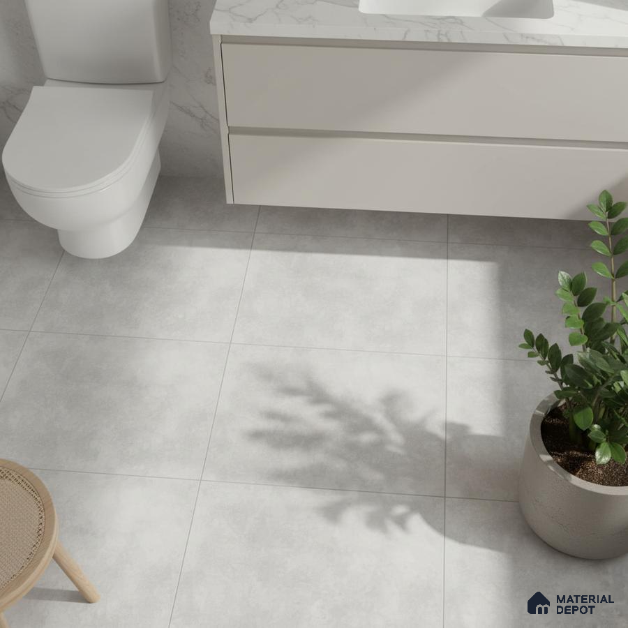 Minimalist bathroom with matte white vanity, marble-look countertop, and light grey floor tiles