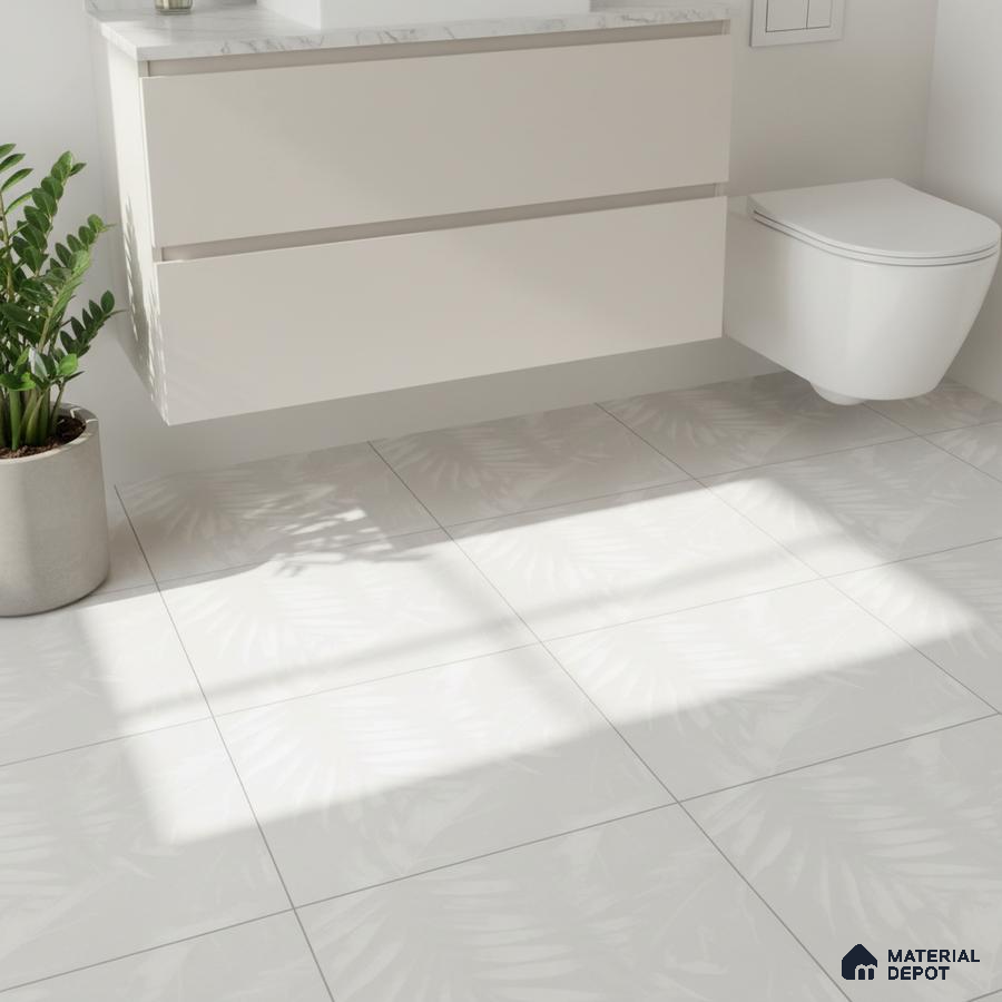 Minimalist bathroom with frosty white floating vanity and subtle leaf-patterned matte floor tiles