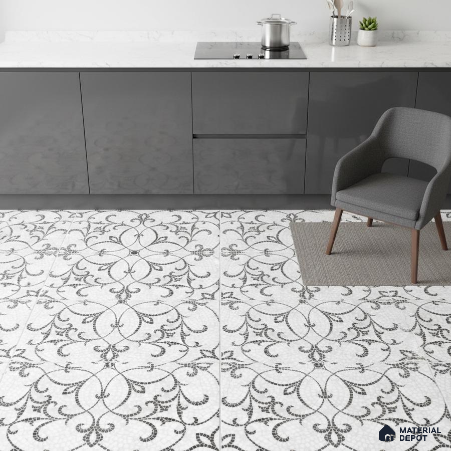 Modern kitchen with grey high gloss laminate cabinets, white marble countertop, and black-and-white floral patterned floor tiles