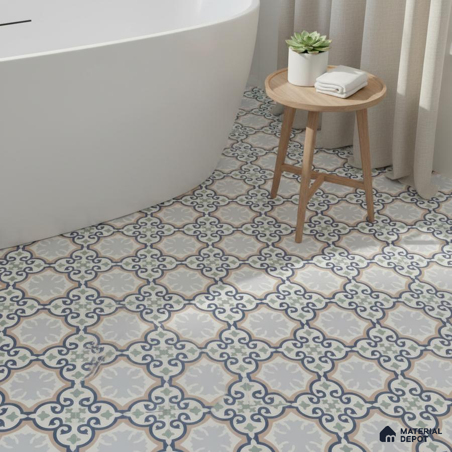 Modern bathroom with blue and green moroccan patterned floor tiles and freestanding tub