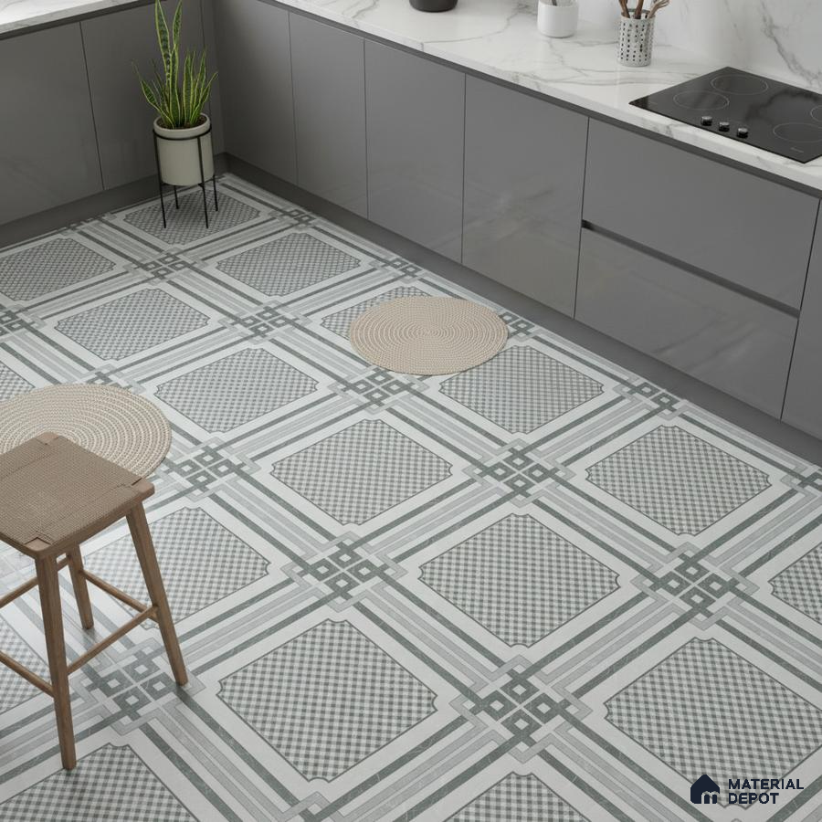 Modern kitchen with grey matte laminate cabinets, white marble-look backsplash, and geometric patterned floor tiles