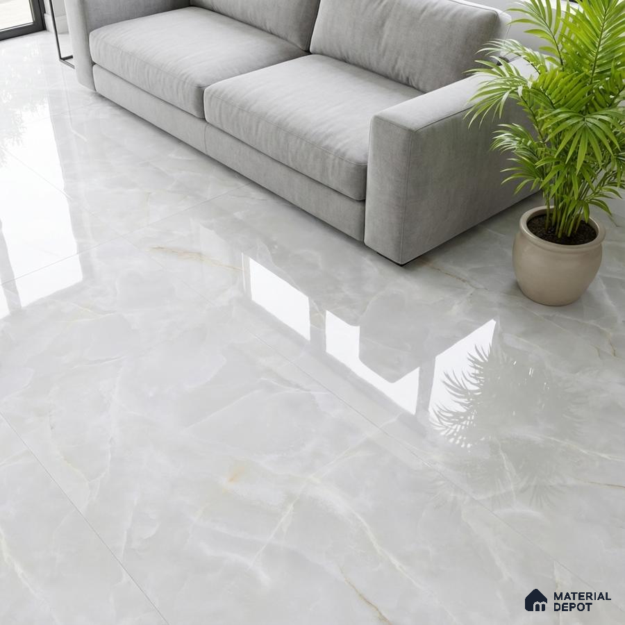 Minimalist living room with glossy white marble-look floor tiles and grey fabric sofa