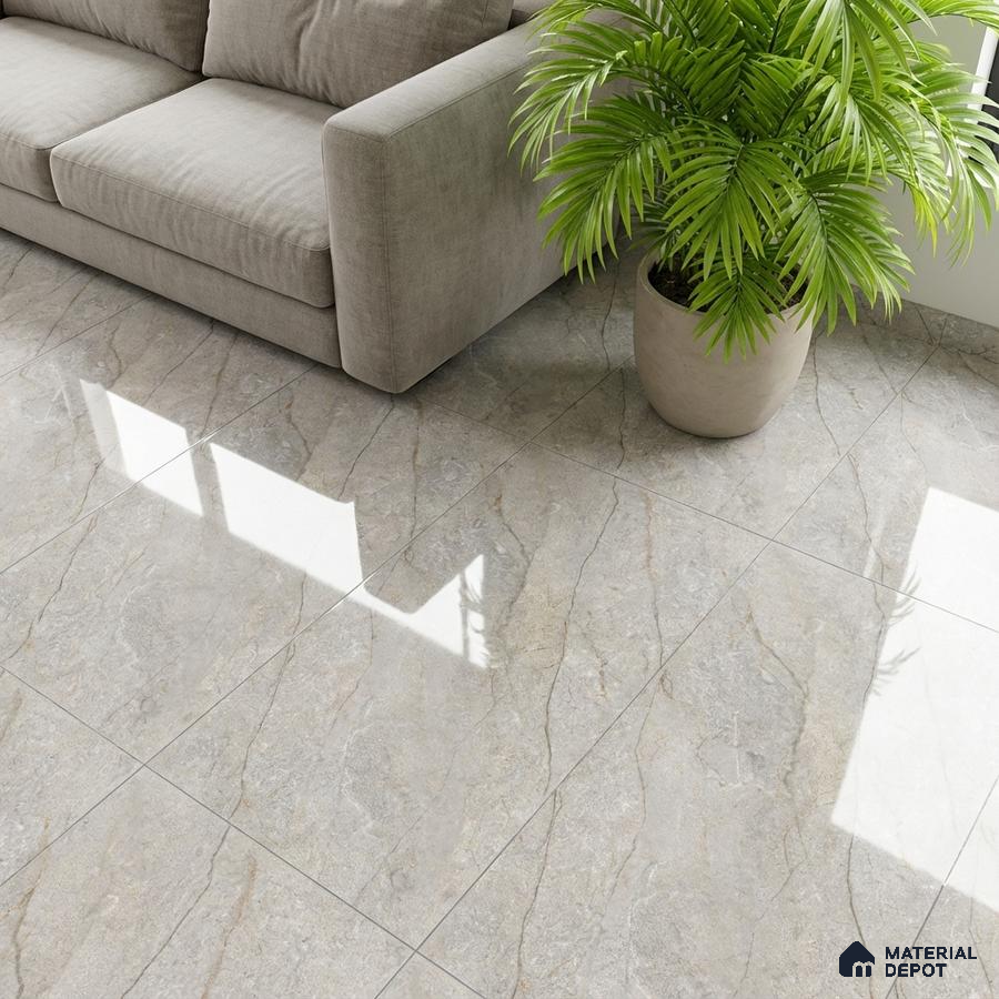 Modern living room with glossy grey marble-look floor tiles and beige fabric sofa