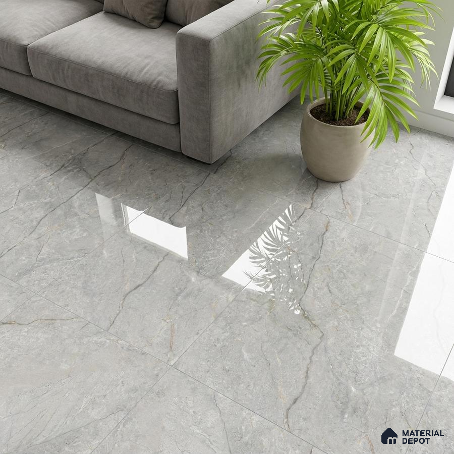 Modern living room with grey marble-look polished floor tiles and grey fabric sofa