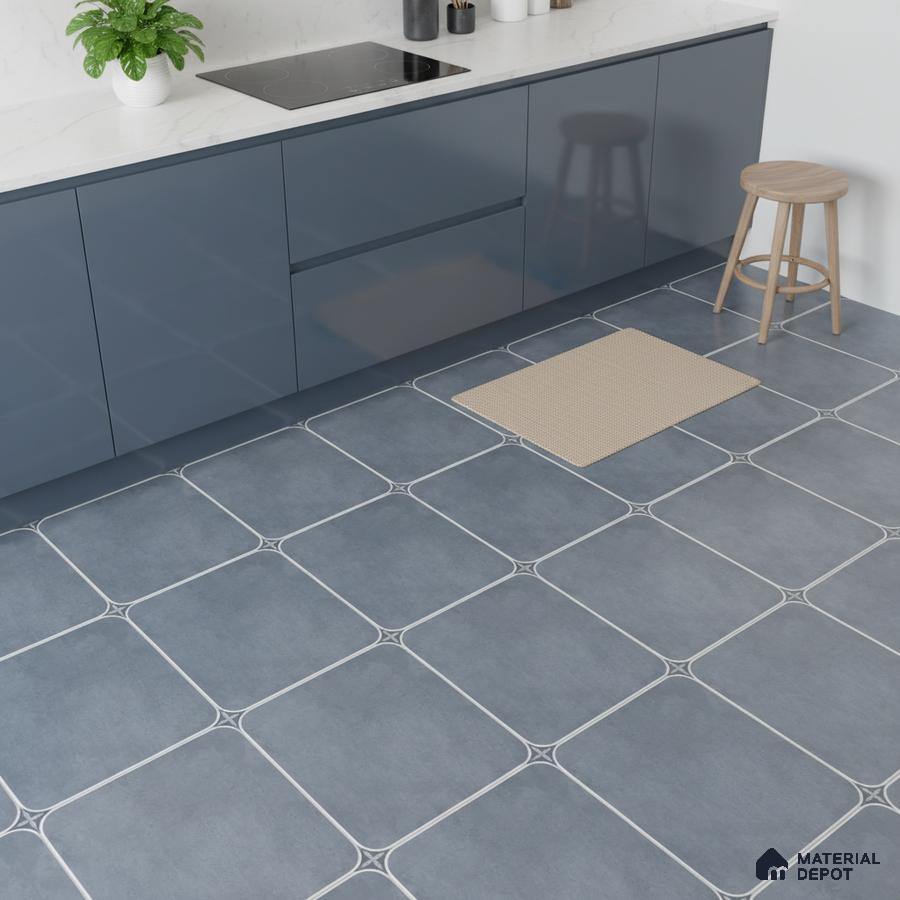 Modern kitchen with blue high gloss laminate cabinets, white marble-look quartz countertop, and blue geometric floor tiles