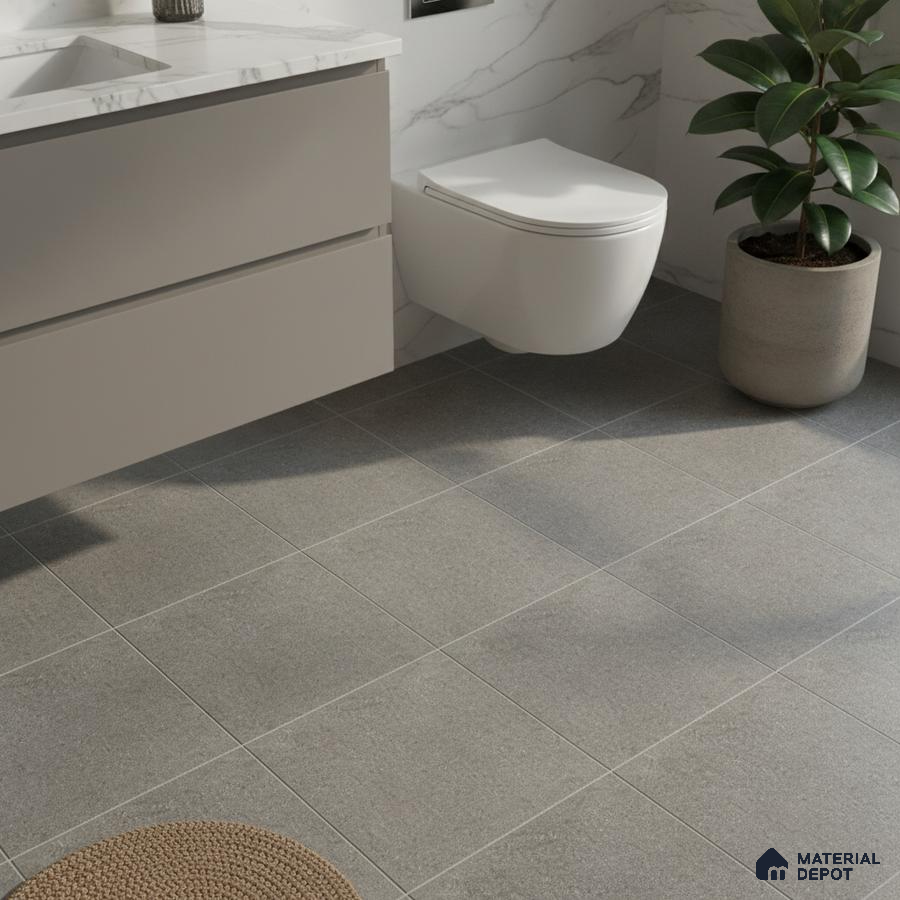 Modern bathroom with grey floor tiles, marble-look wall tiles, and matte beige vanity