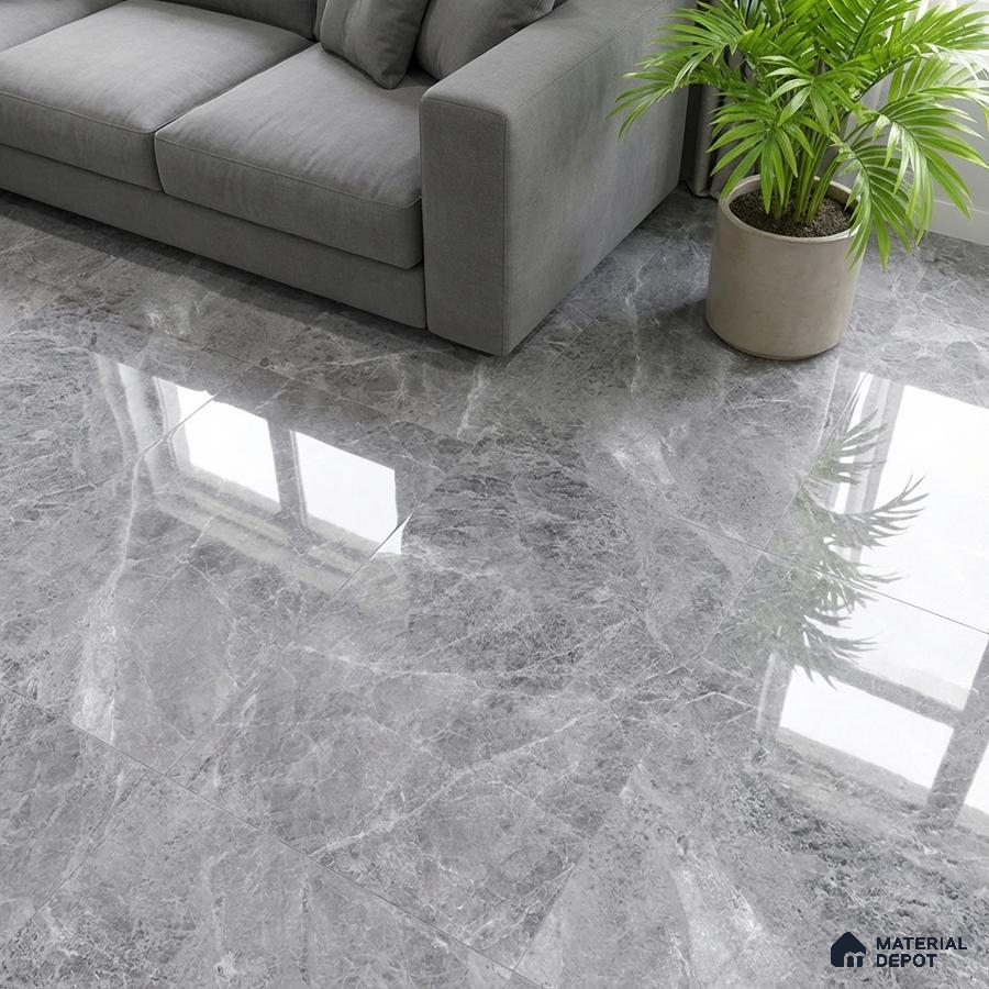 Modern living room with grey marble-look polished floor tiles and grey fabric sofa