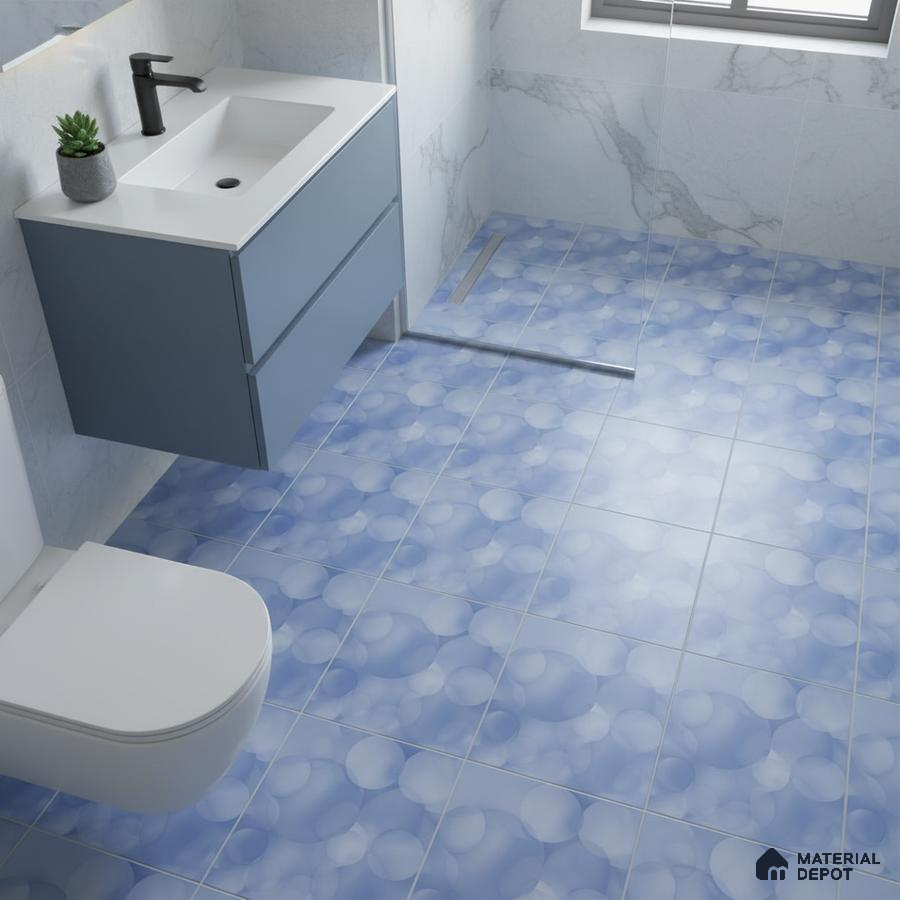 Modern bathroom with blue bubble patterned floor tiles and marble wall tiles