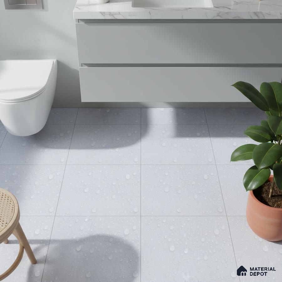 Minimalist bathroom with matte white floor tiles and marble countertop vanity