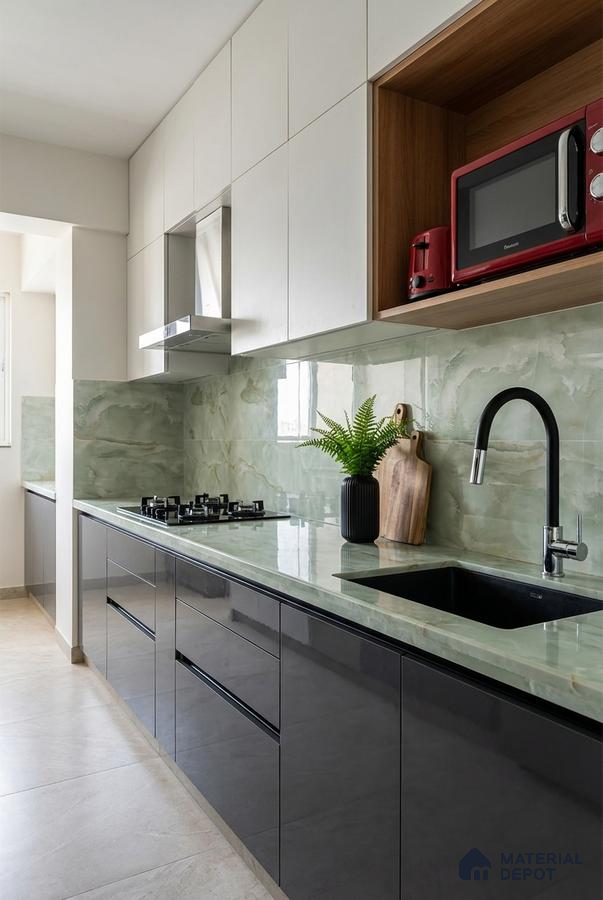Modern kitchen with glossy black laminate, frosty white laminate, and green marble-look backsplash and countertop