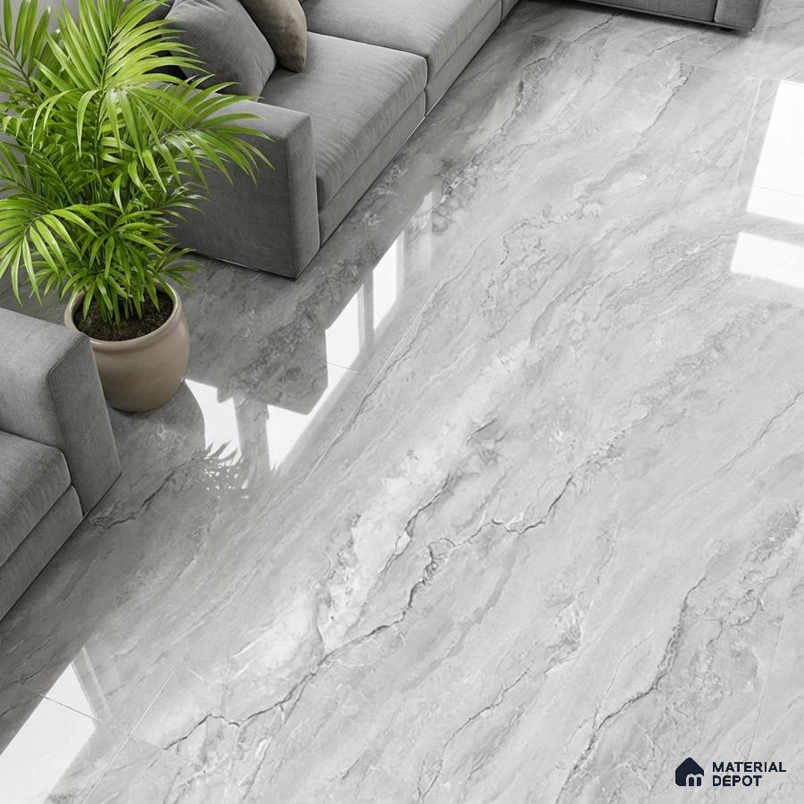 Modern living room with grey marble-look polished floor tiles and grey fabric sofa