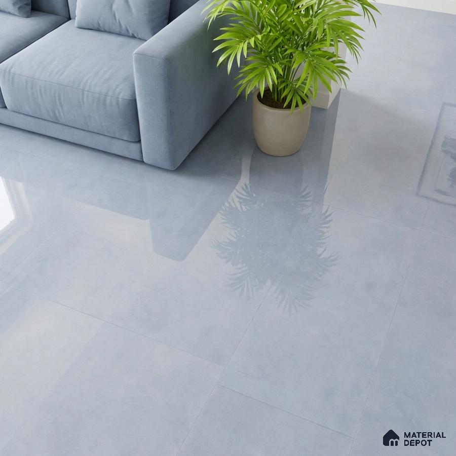 Minimalist living room with glossy pale grey floor tiles and pastel blue fabric sofa