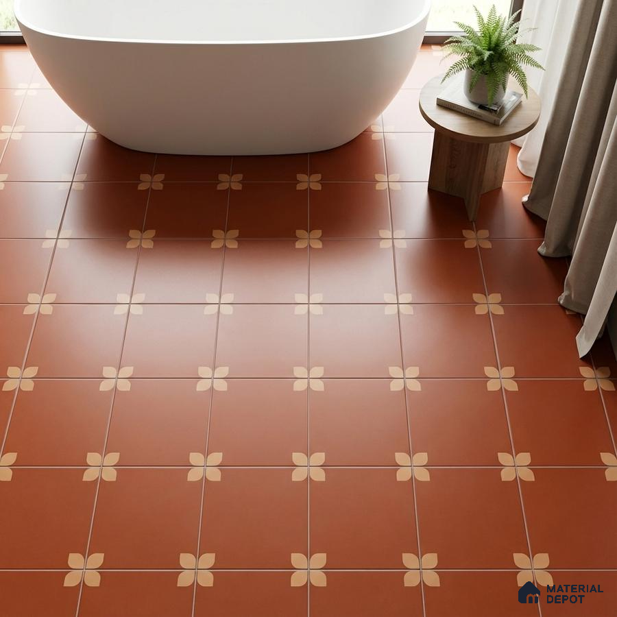 Modern bathroom with terracotta floral patterned floor tiles and freestanding tub