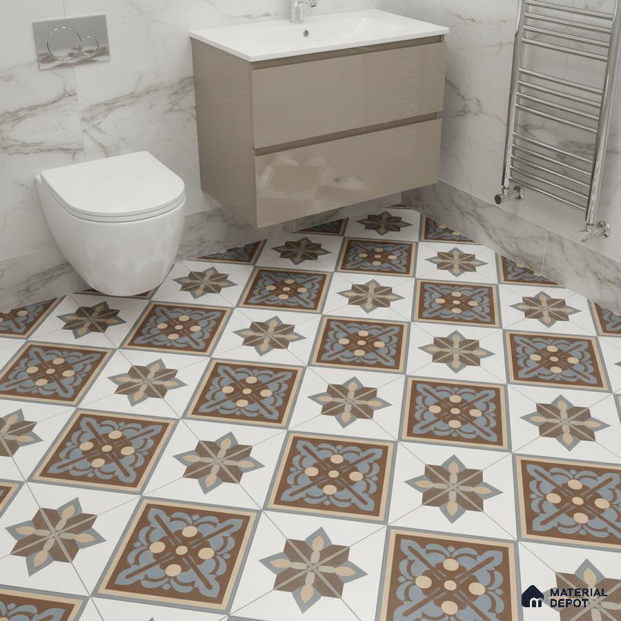 Modern bathroom with marble wall tiles and blue-brown geometric patterned floor tiles