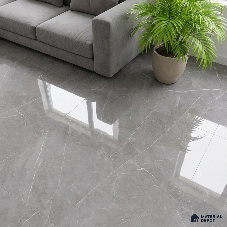 Modern living room with grey marble-look polished floor tiles and grey fabric sofa