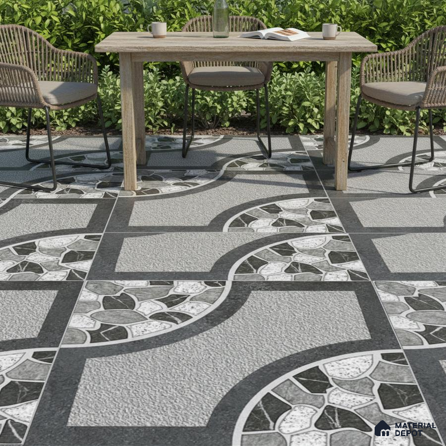 Modern outdoor space with geometric patterned grey and black floor tiles
