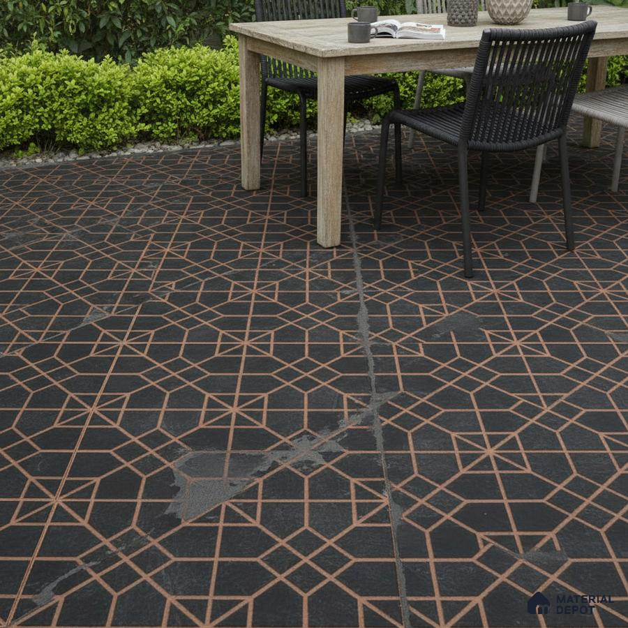 Modern outdoor space with geometric patterned black floor tiles and natural wood dining table