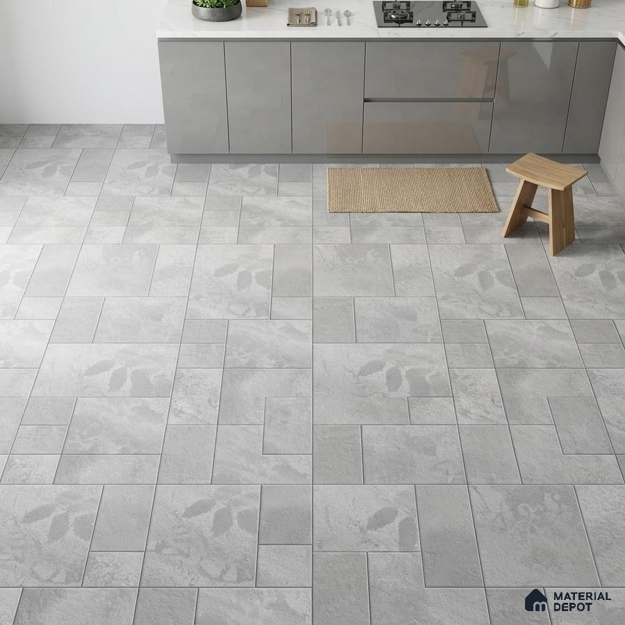 Modern kitchen with grey high gloss laminate cabinets and light grey patterned stone floor tiles