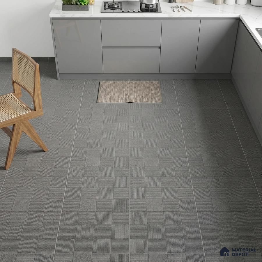 Modern kitchen with grey matte laminate cabinets and geometric grey floor tiles