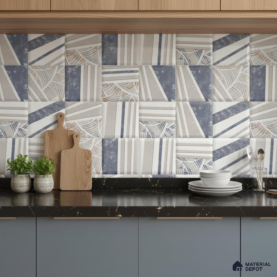 Modern kitchen with geometric blue and beige patterned backsplash tile, black marble countertop, and matte blue laminate cabinets